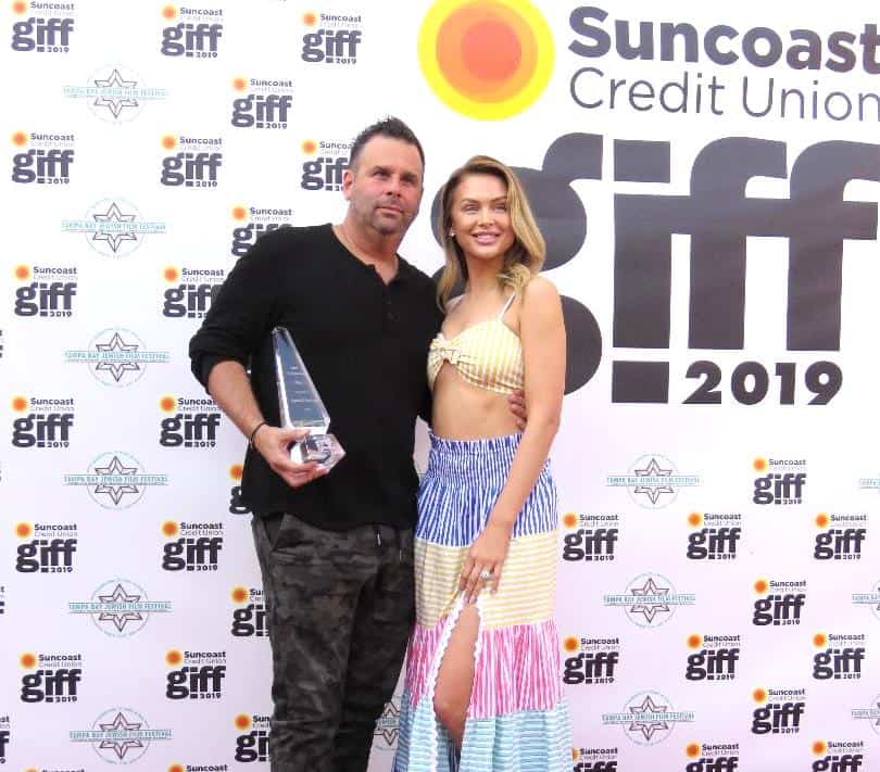 Lala Kent poses with her fiance Randall Emmett who was honored with a Career Achievement Award at the 2019 Gasparilla International Film Festival